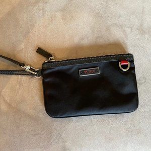 Authentic brand Tumi clutch